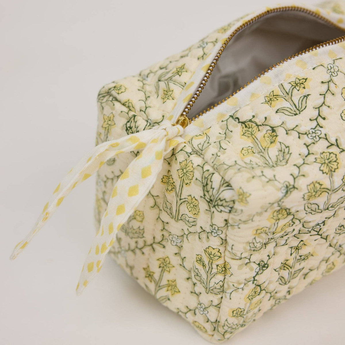 hand block print quilted toiletry bag medium floral lattice buttercream organic cotton