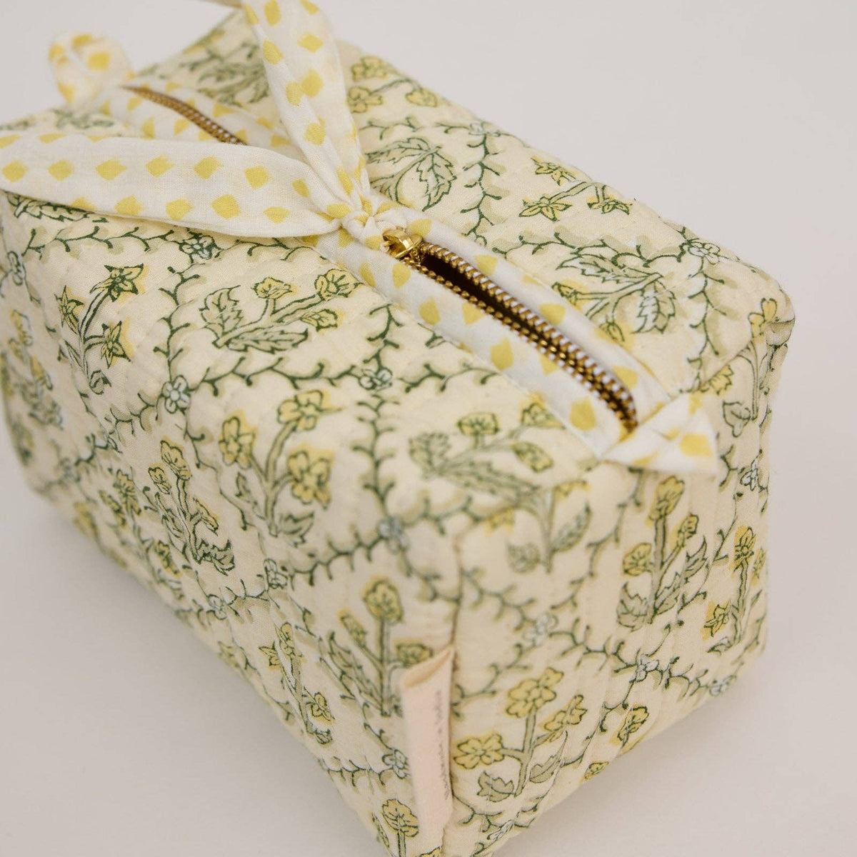 hand block print quilted toiletry bag small floral lattice buttercream organic cotton